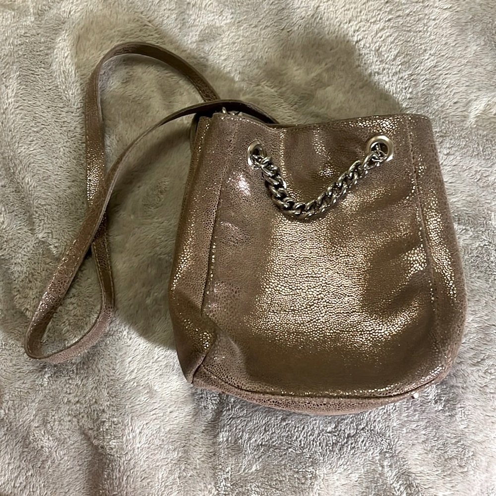 One of a kind brown/gold purse made from the best quality Argentinean leather.